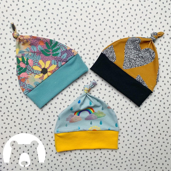 knotted baby hats with contrast trim